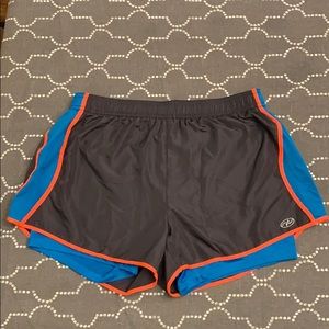 Pair of running shorts and six head bands
